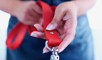 woman with dog leash